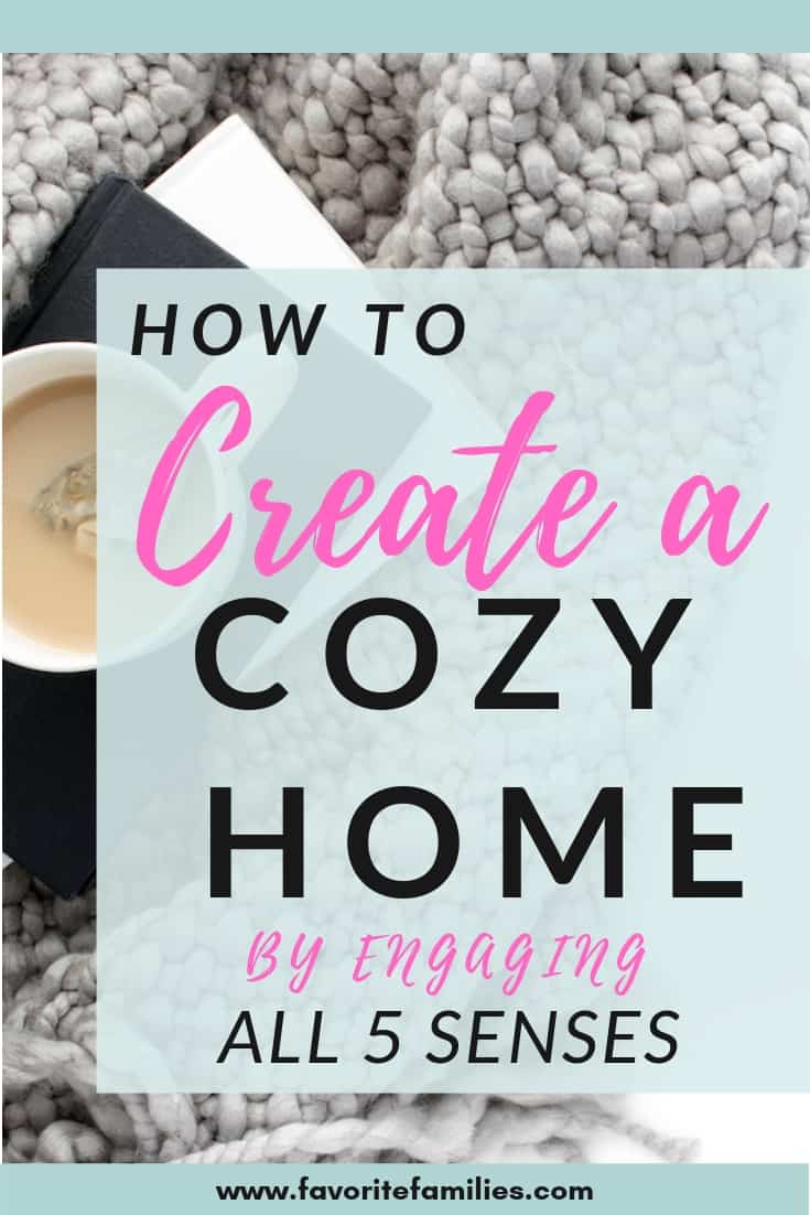 cozy blanket and cup of tea with text overlay how to create a cozy home by engaging all 5 senses