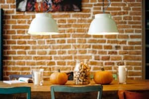 Family Thanksgiving Table with pumpkins