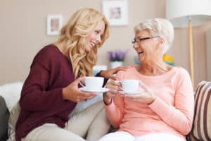 mother-in-law laughing with daughter-in-law