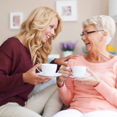 mother-in-law laughing with daughter-in-law