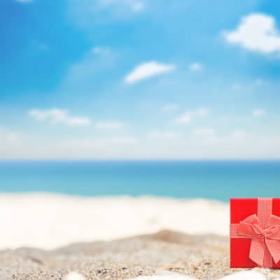 red gift box on the beach