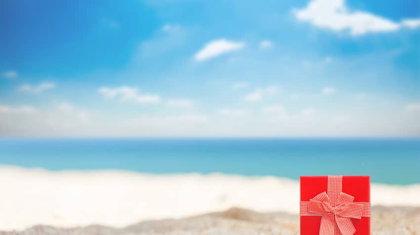 red gift box on the beach