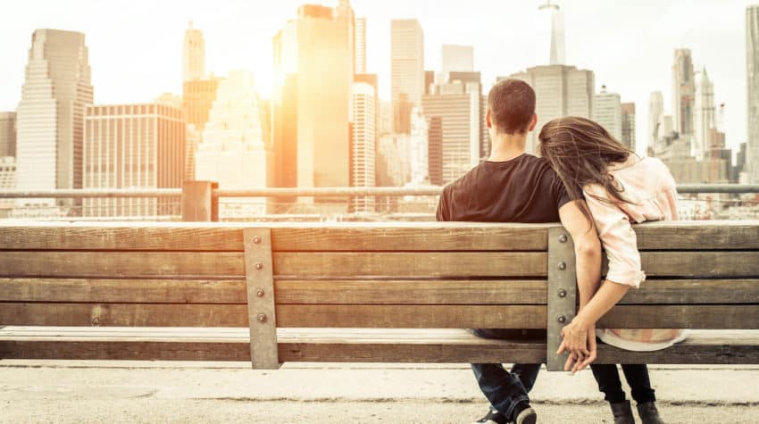 couple holding hands on a romantic date