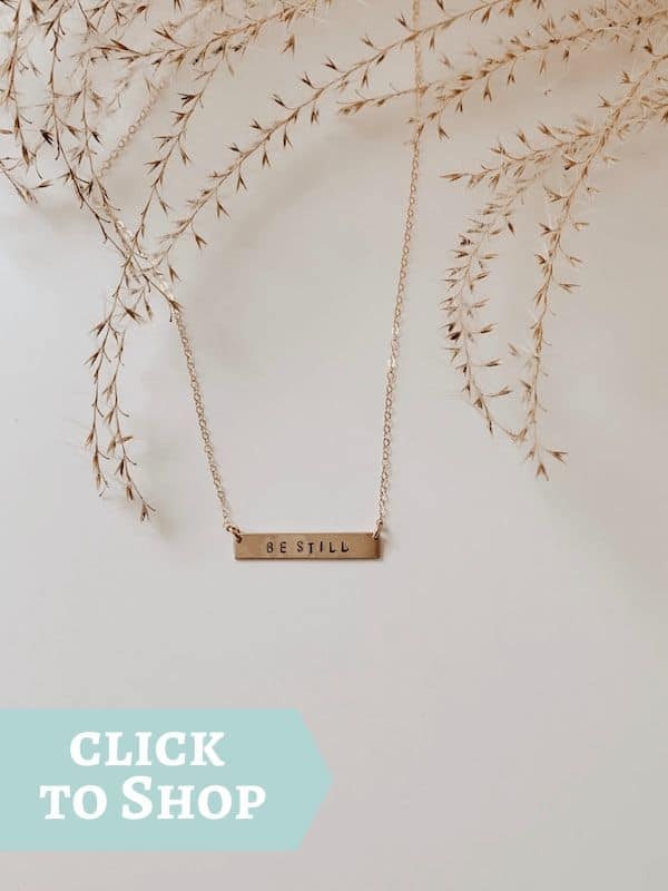 gold filled bar necklace hand stamped with the words Be Still by Oceanne